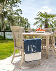 gray teak and rope chairs