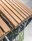 Teak Adirondack Footstool outdoors