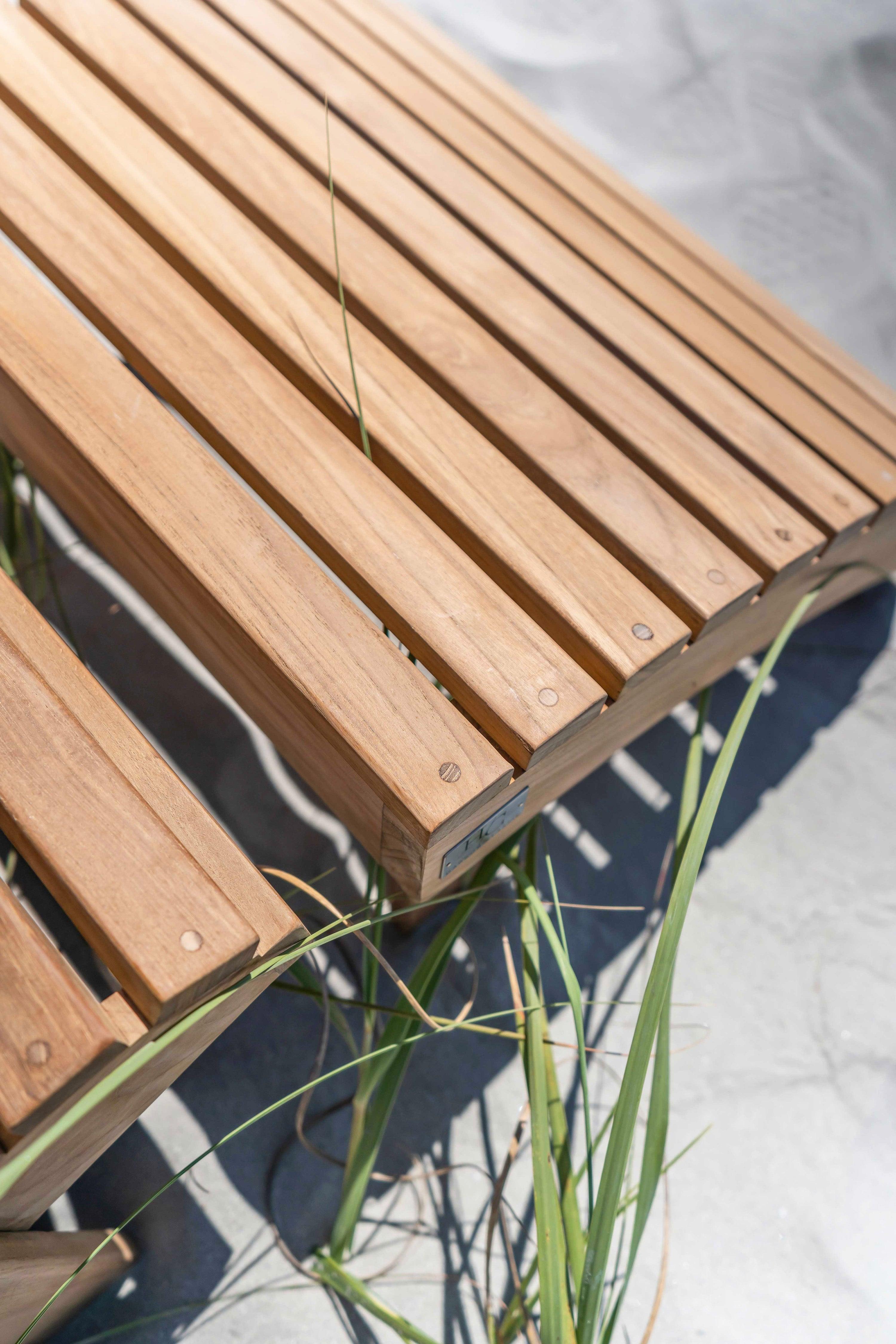 Teak Adirondack Footstool outdoors